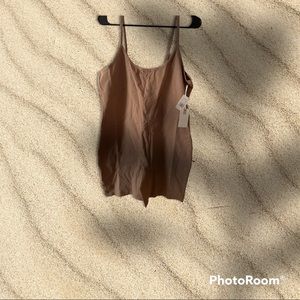 Beige nude one piece jumper size 6